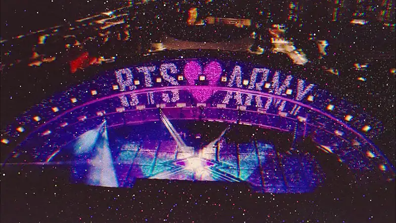 La Historia de BTS: Asombroso Cómo Estos Chicos de K-pop Se Convirtieron en Leyenda 5 Fans de BTS ARMY con lightsticks en concierto